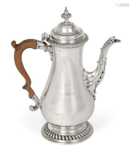 A George III Silver Coffee-Pot, Maker's Mark Worn, London, Probably 1764, pear-shaped and on