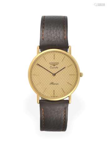 A Gold Plated Wristwatch, signed Longines, model: Presence, circa 1985, quartz movement, textured