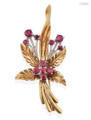 A 9 Carat Gold Ruby Brooch, realistically modelled as a floral spray, the yellow textured leaves