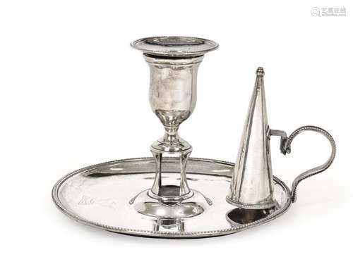 A George III Silver Chamber-Candlestick, by Hester Bateman, London, 1785, circular and with beaded