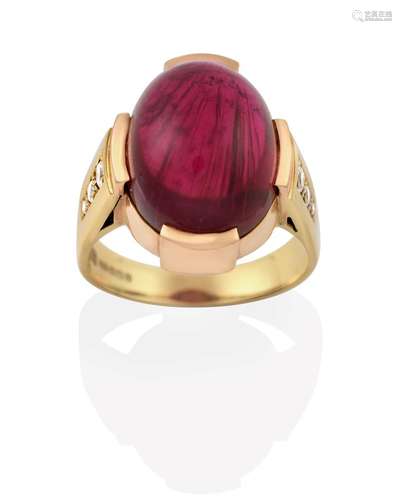 An 18 Carat Gold Pink Tourmaline Ring, the oval cabochon pink tourmaline in a yellow claw setting,