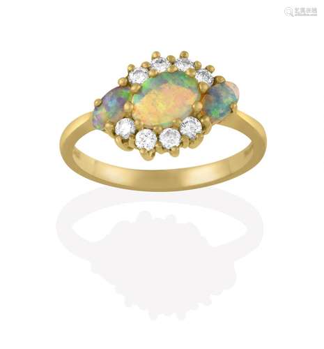 An 18 Carat Gold Opal and Diamond Cluster Ring, the three oval cabochon opals within a border of