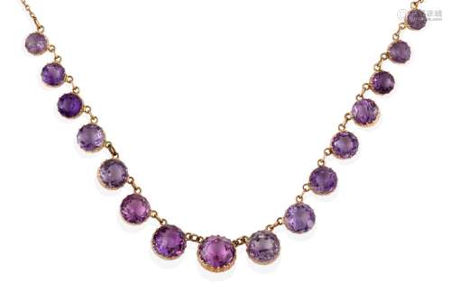 An Edwardian Amethyst Necklace, sixteen graduated round cut amethysts in yellow collet settings,