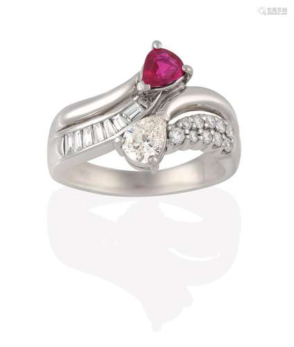 A Ruby and Diamond Ring, the parted shoulders set throughout with baguette cut and round brilliant