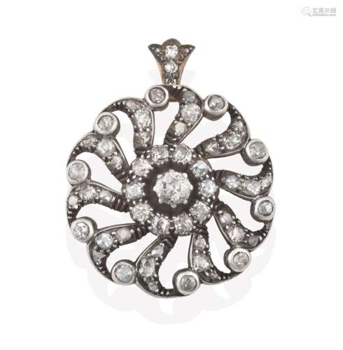 An Early 20th Century Diamond Cluster Pendant, of openwork wheel design, an old cut diamond within a