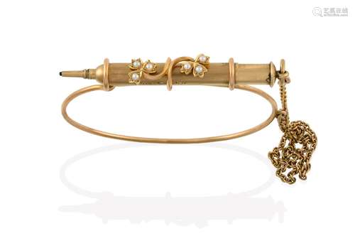 An Edwardian Split Pearl Propelling Pencil Bridge Bangle, the yellow bangle with three loops to