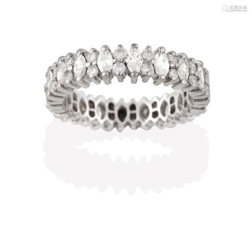 A Diamond Eternity Ring, the continuous band formed of marquise cut diamonds alternating with
