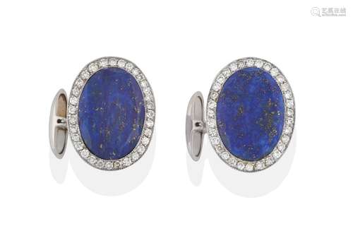 A Pair of Lapis Lazuli and Diamond Cufflinks, the oval lapis lazuli plaque within a border of