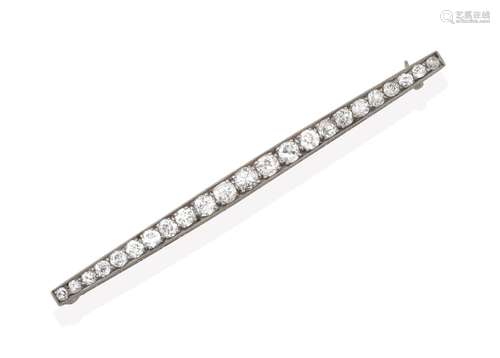 A Diamond Bar Brooch, the tapering bar set throughout with graduated old cut diamonds, in white claw