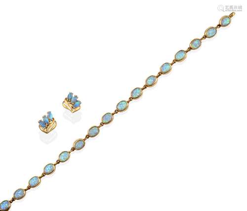 An Opal Bracelet, the sixteen chain linked oval cabochon opals in yellow rubbed over settings,