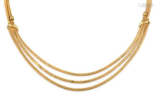 A Fancy Brick Link Necklace, two rows of yellow brick links split into three graduated rows to the