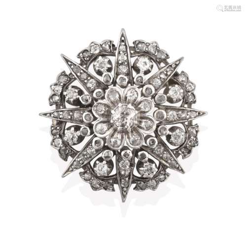 A Late 19th Century Diamond Brooch, of cluster star design, an old cut diamond centrally to a