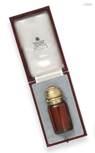 A Victorian Silver-Gilt Mounted Ruby-Glass Scent-Bottle, by Frederic Purnell, London, 1881, Retailed