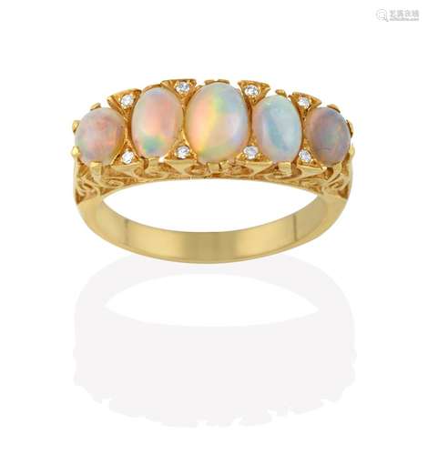 An Opal and Diamond Ring, the five graduated oval cabochon opals with eight-cut diamond accents,