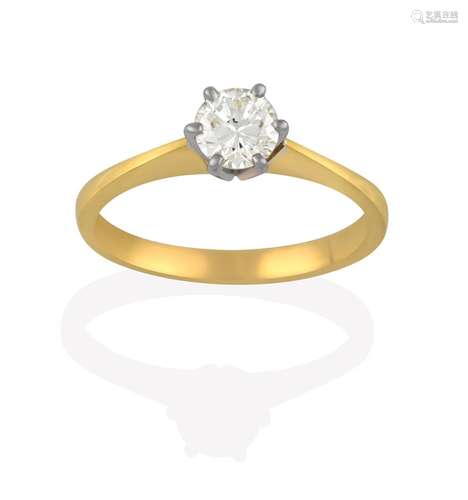 An 18 Carat Gold Diamond Solitaire Ring, the round brilliant cut diamond in a white claw setting, to