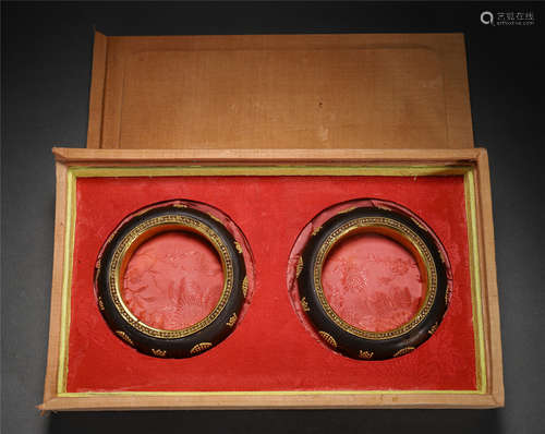 Pair Of Chinese Agalwood Bangles, Gold Decorated, With Box