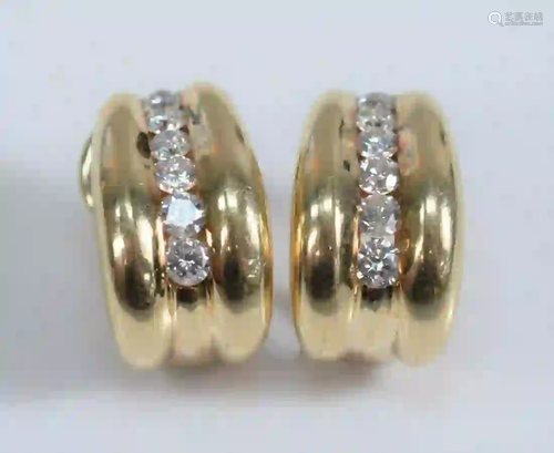 Pair of 14 Karat Gold Earrings each set with six