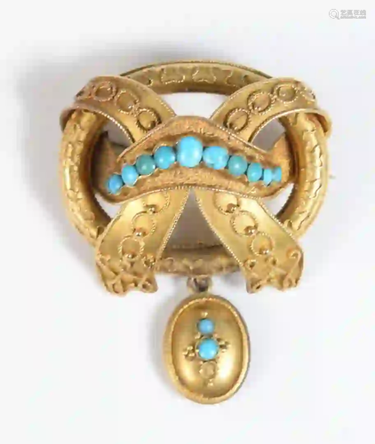 14 Karat Gold Victorian Brooch set with turquoise, hung