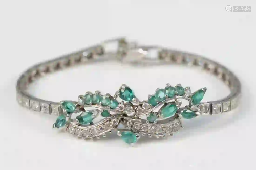 14 Karat White Gold Bracelet set with emeralds, and