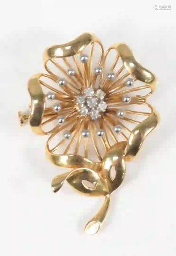 14 Karat Gold Floral Brooch set with seven diamonds