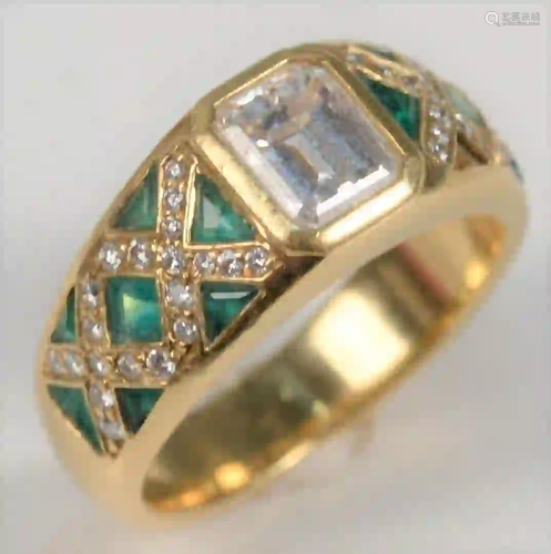 18 Karat Yellow Gold Ring set with emerald cut