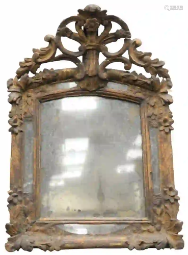 Small Continental Mirror having carved gilt wood and