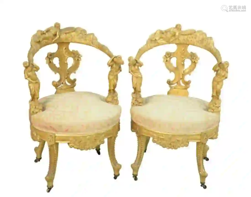 Pair of Carved and Gilt Decorated Armchairs top rail