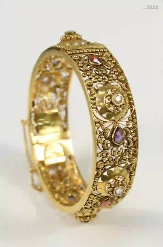 22 Karat Gold Bangle Style Bracelet with open work, and