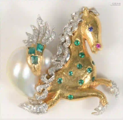 18 Karat Gold and White Horse Brooch set with emeralds,