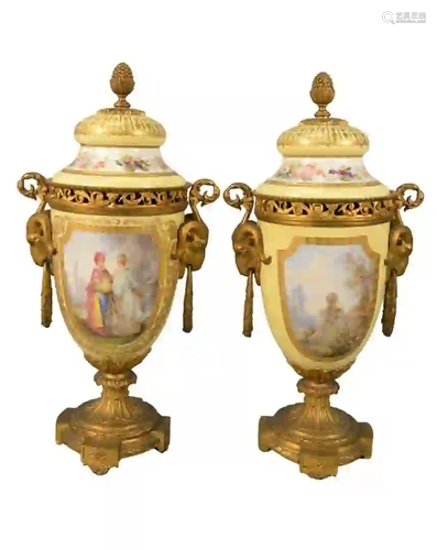 Pair of Sevres Porcelain and Gilt Bronze Urns yellow