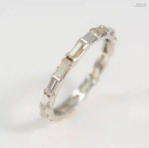 14 Karat White Gold Channel Band set with emerald cut