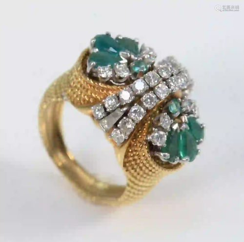 18 Karat Yellow Gold Ring set with eight emeralds, and