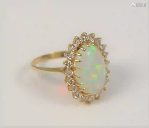 14 Karat Gold Ring set with cabochon cut opal 16