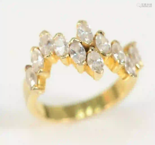 18 Karat Gold Ring set with twelve marquis diamonds