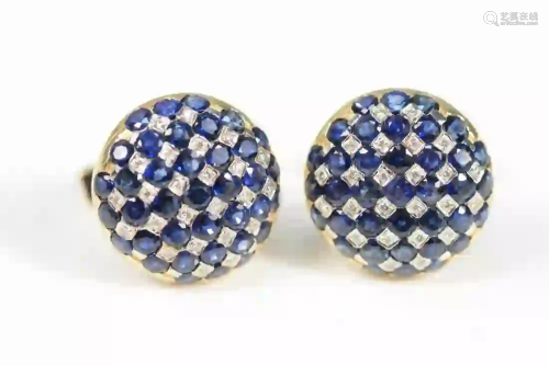 Pair of 14 Karat Gold Cufflinks set with blue sapphires