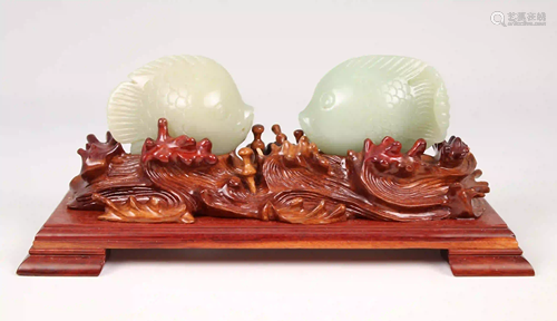 Pair of Jade Fish on Wooden Stand