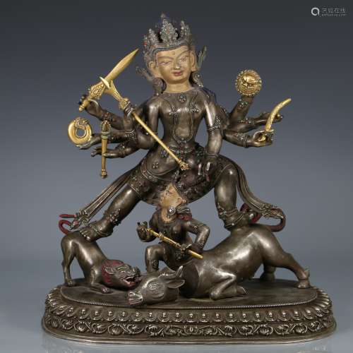 A Gem-Embellished Gilt Bronze Figure of Buddha on Beast