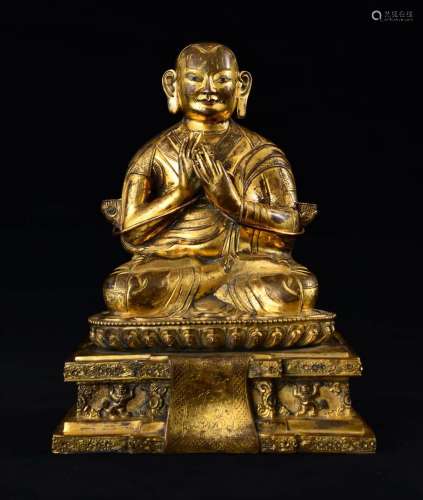 Gilt Bronze Figure Of Guru On Lotus Stand