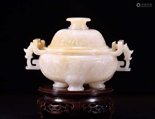 A HETIAN JADE DOUBLE EAR TRIPOD CENSER WITH PATTERN