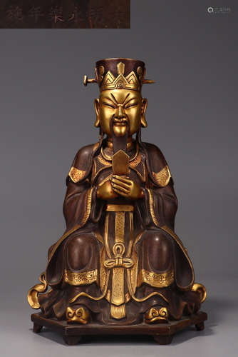 A GILT BRONZE JADE EMPEROR STATUE