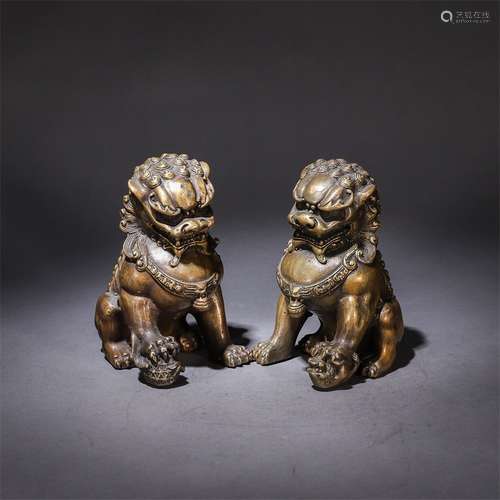 Pair Of Bronze Lion Shaped Ornaments