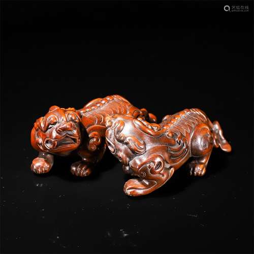 Pair Of Boxwood Beast Ornaments