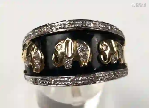 Ring 585 gold. Elephants with diamonds. 7.9 grams.