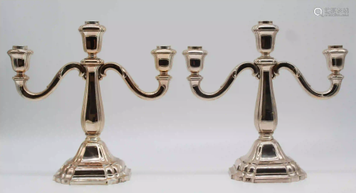 A pair of candlesticks. Silver 835.