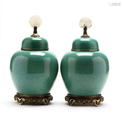 Pair of English Ceramic Apple Green Jars with Covers