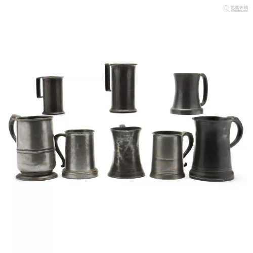 A Collection of Eight Antique Pewter Tankards