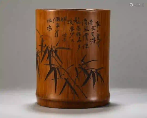 A CARVED BAMBOO BRUSH POT WITH INSCRIPTION