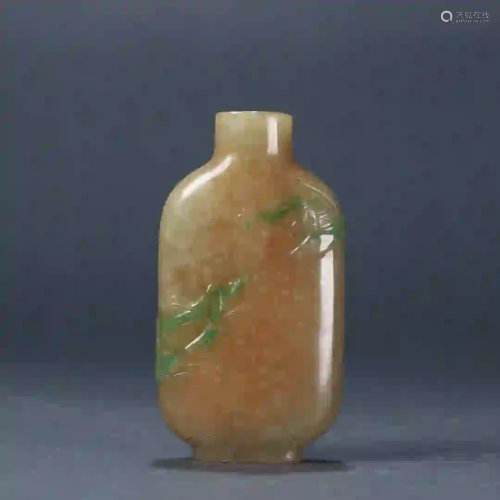 A JADEITE CARVING SNUFF BOTTLE