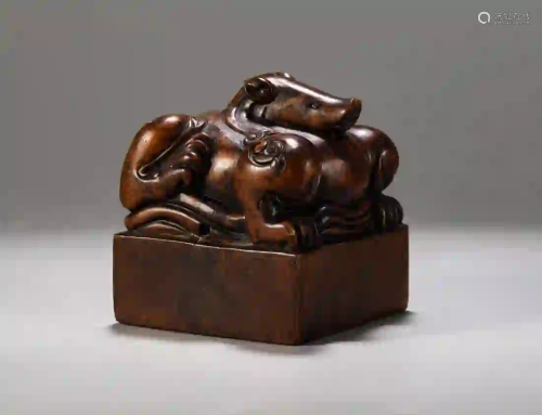 A CARVED SANDALWOOD 'BEAST' SQUARE SEAL