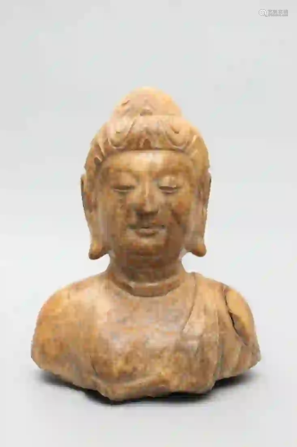 A STONE CARVING BUDDHA STATUE
